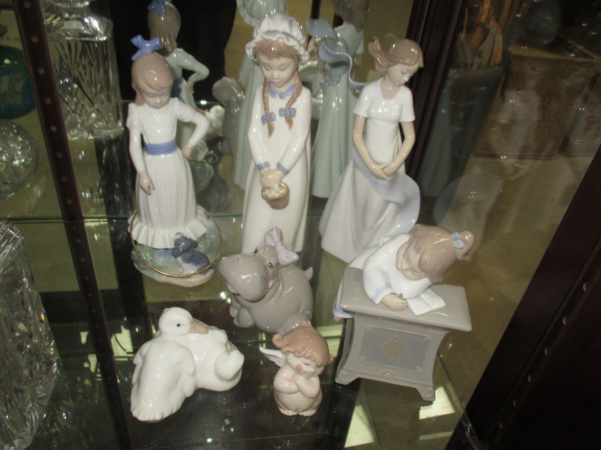 7 x assorted Nao figurines