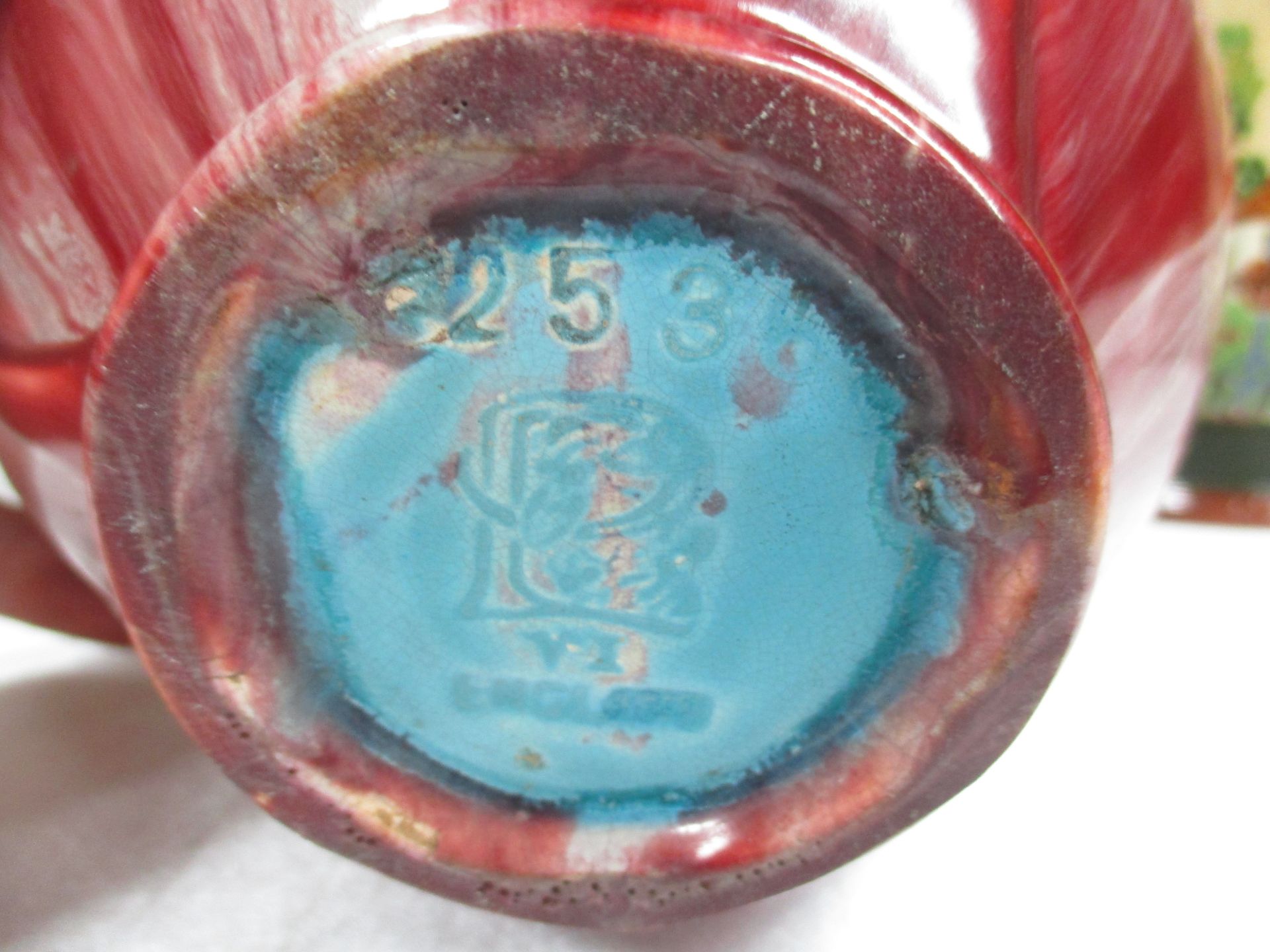 An Art Nouveau pottery tyg jug with a red glaze - manufacturers mark to the base Further - Image 8 of 12
