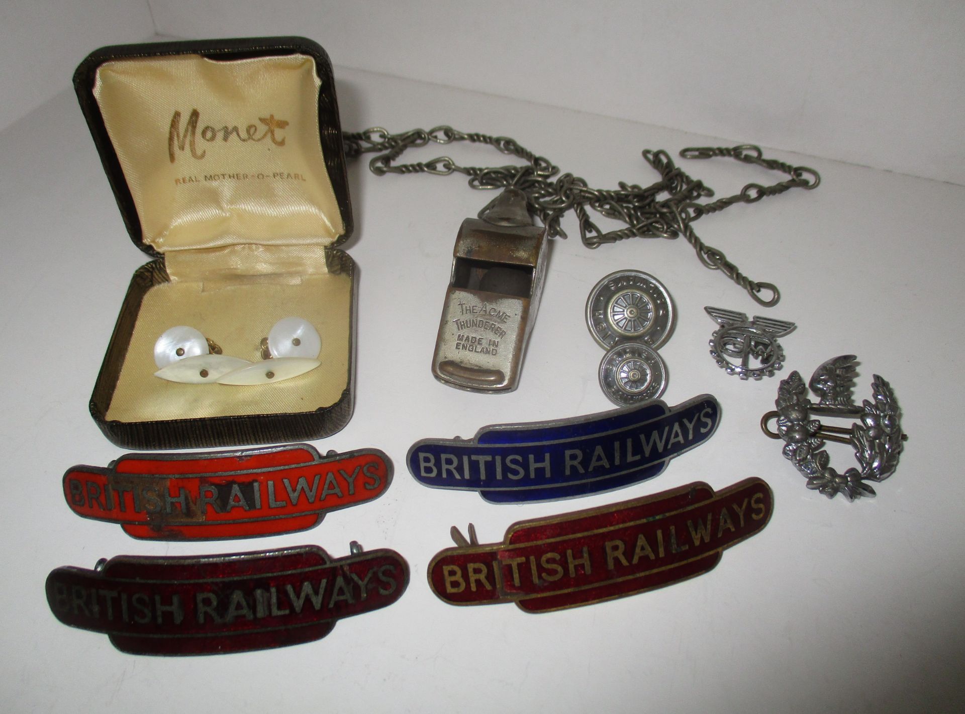 4 x British Railway badges, an Acme Thunderer whistle,