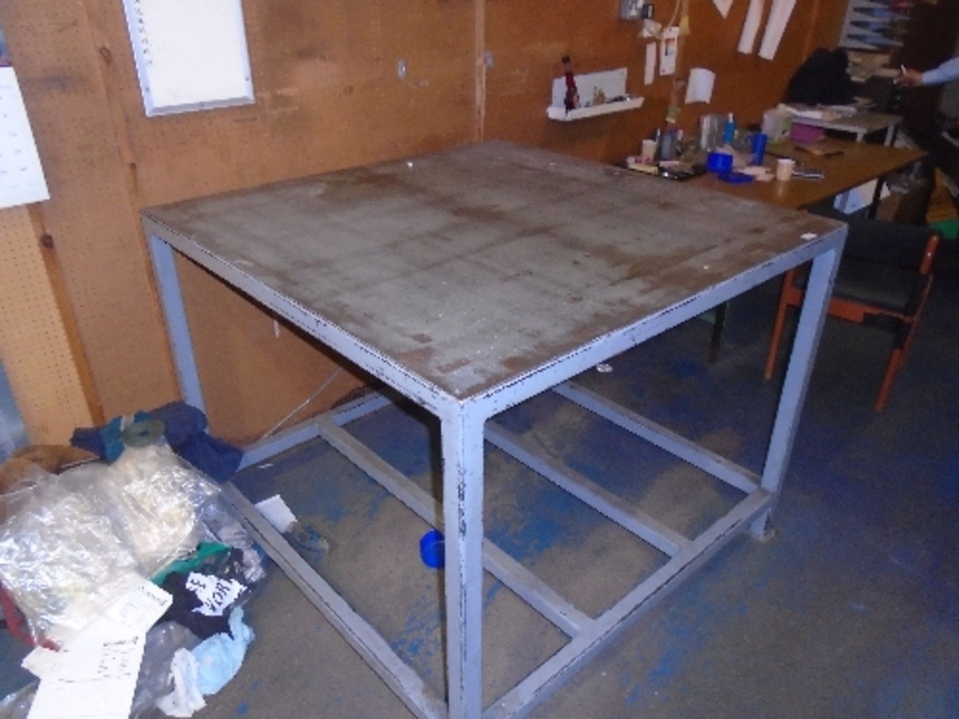A steel metal work table 125 x 125cm