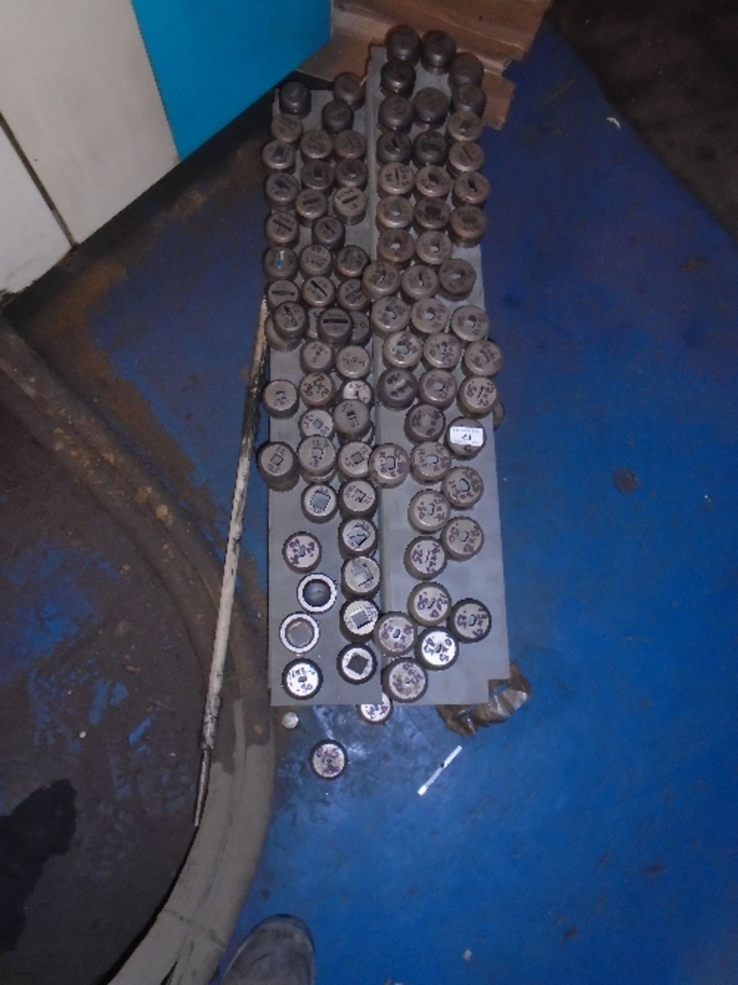 A quantity of assorted metal press die cutters