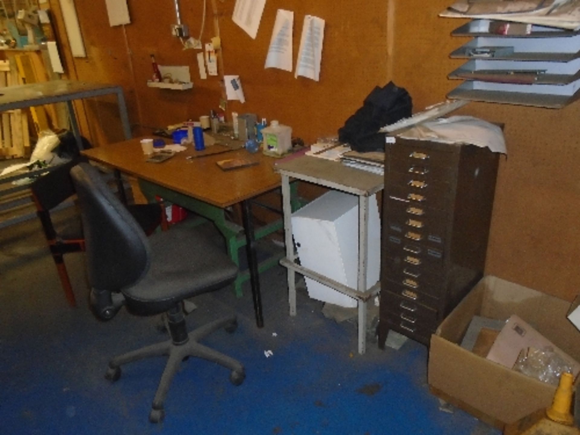 A brown metal 15 drawer Index cabinet complete with a small metal table, office chair, desk,