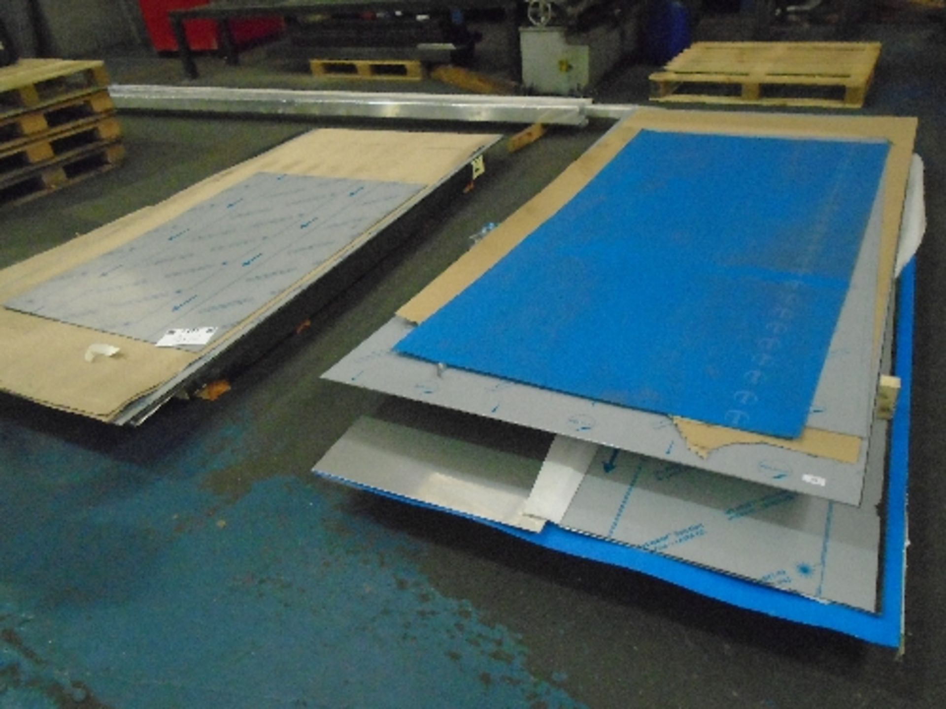 Contents to two pallets - a quantity of assorted sheets of galvanised metal,