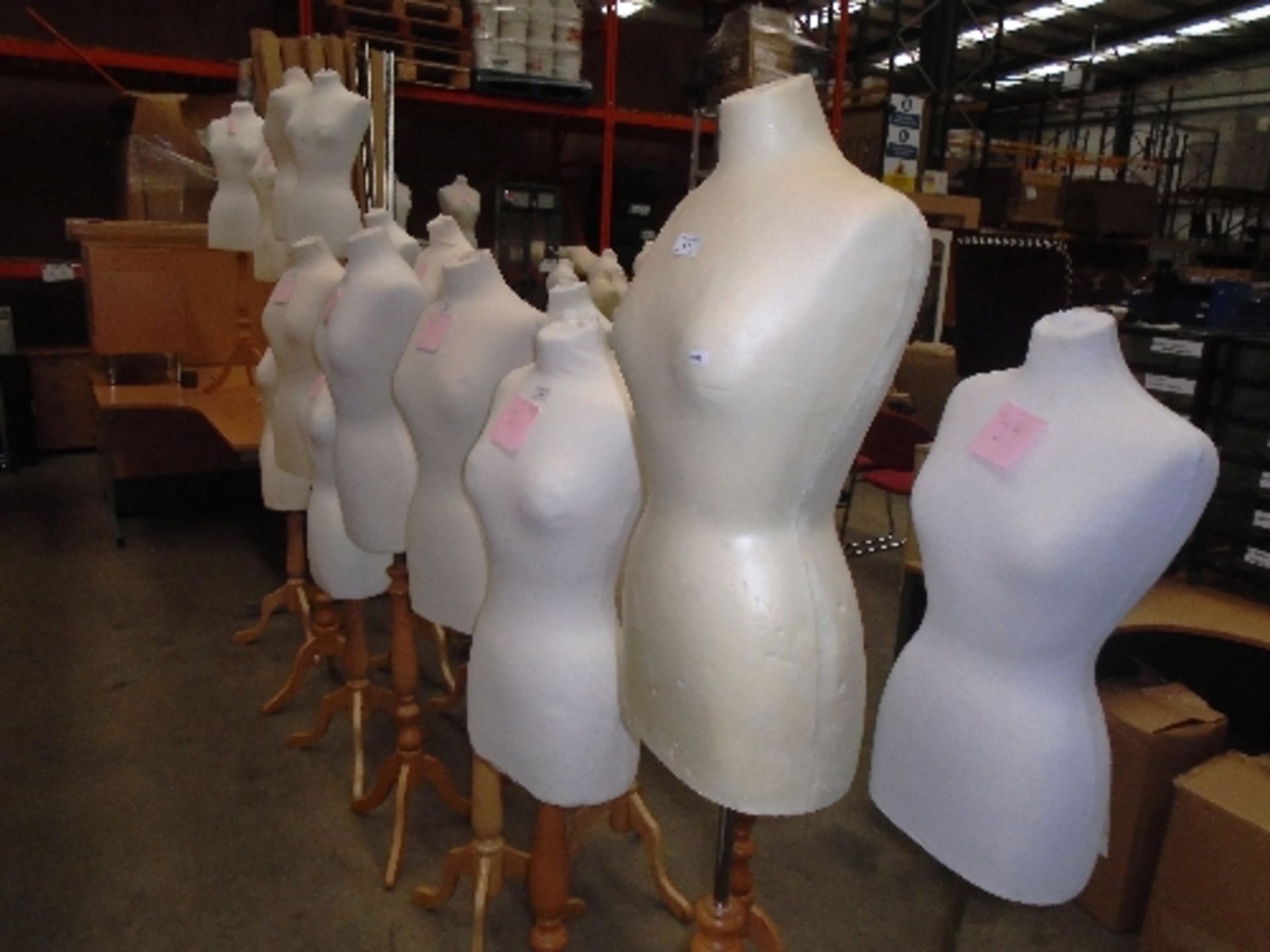 4 x female torso mannequins on light wooden bases