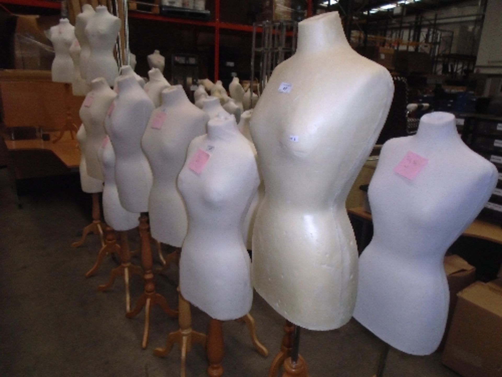 2 x female torso mannequins on light wooden bases