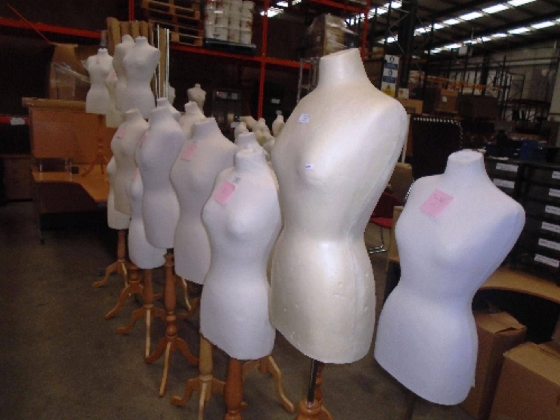 9 x female torso mannequins on light wooden bases