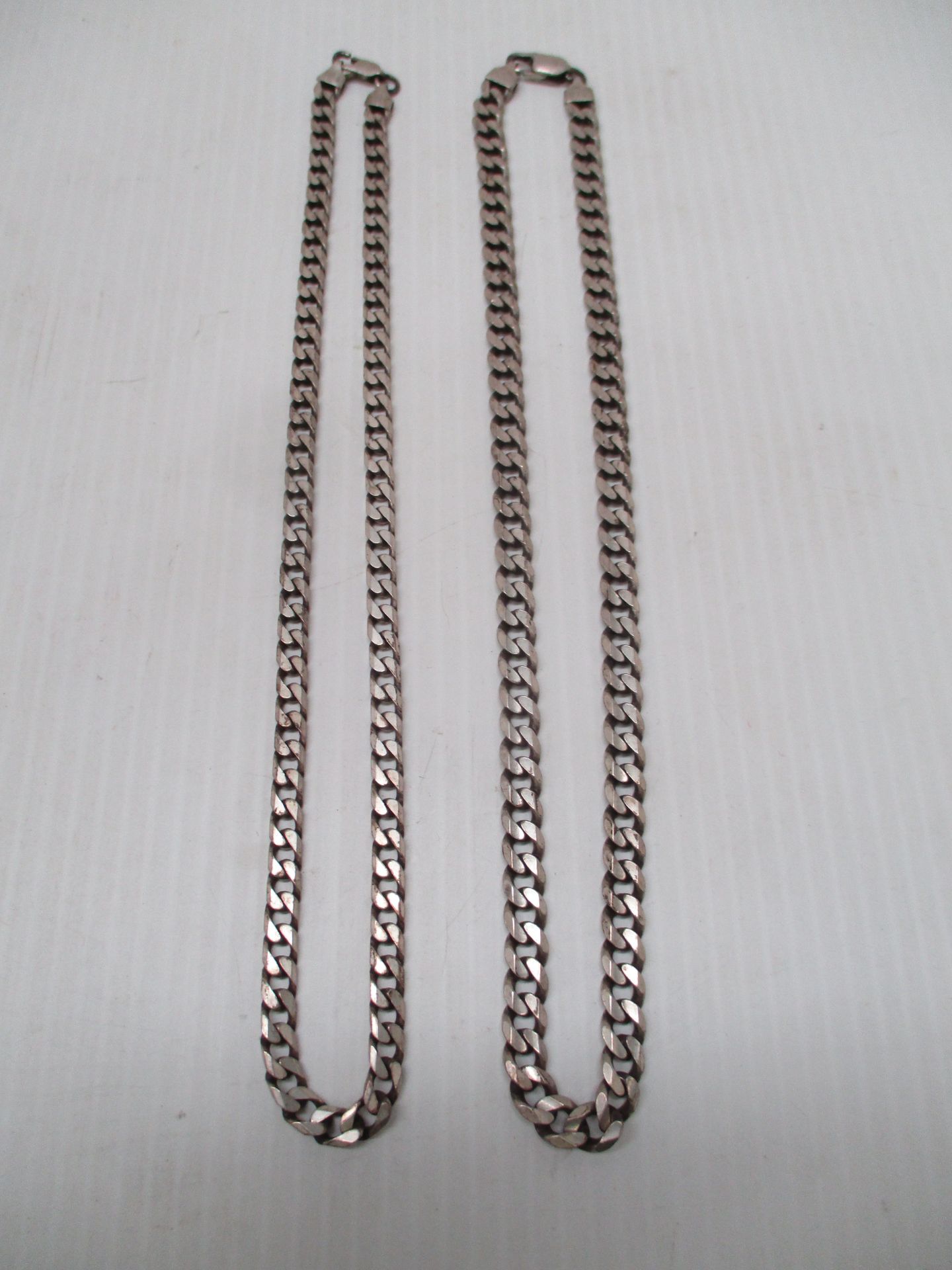 Two silver neck chains (total approx weight 71.