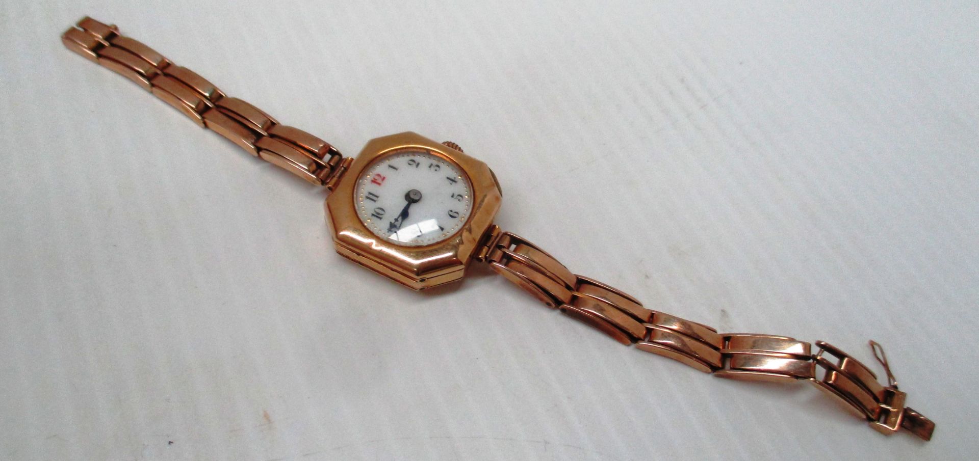 A gents wristwatch with 18ct gold case and 15ct gold expanding bracelet