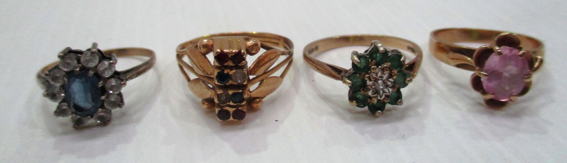 Two 9ct gold rings set with assorted stones and two other dress rings