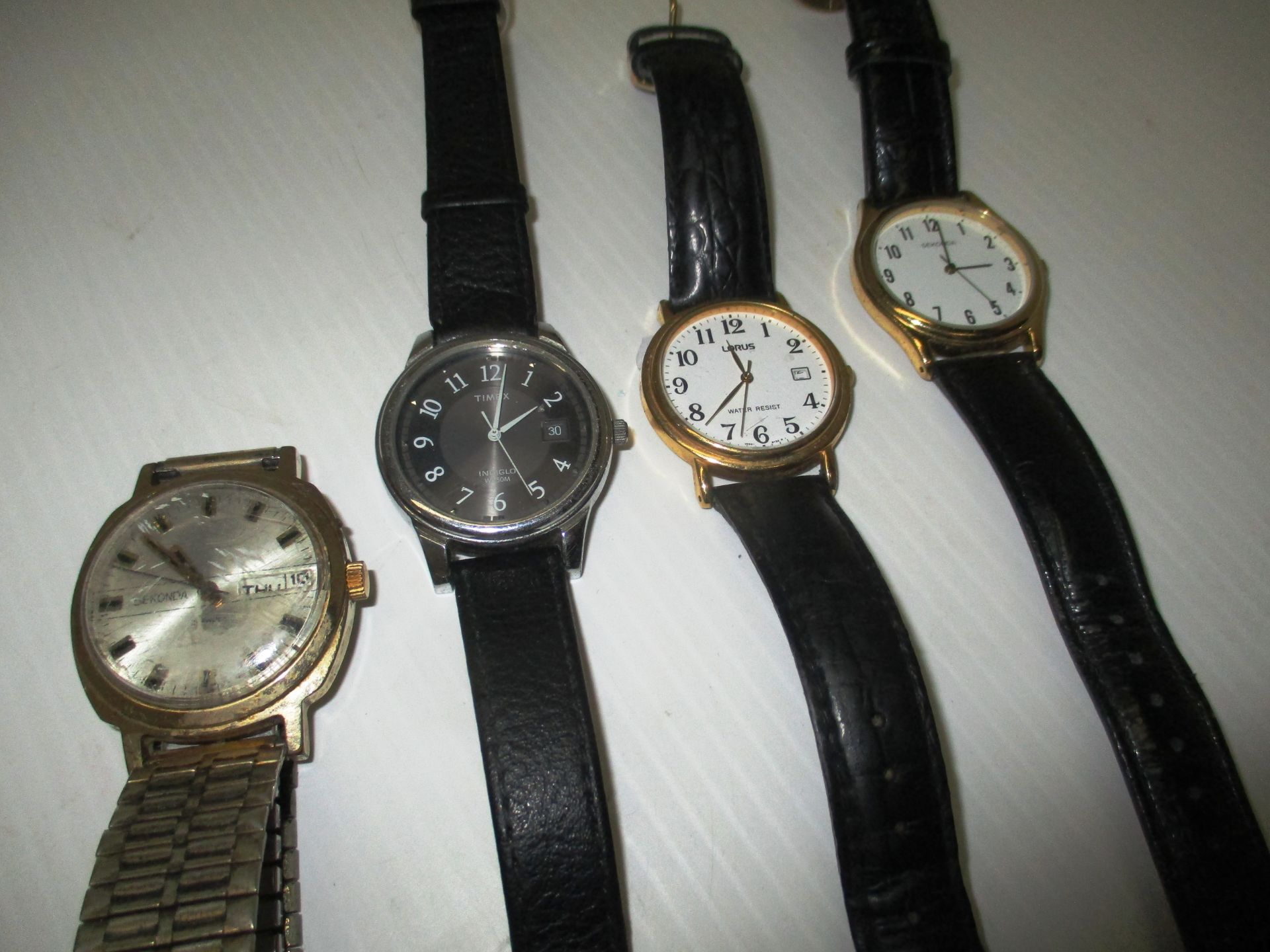 Four assorted gents wristwatches by Sekonda,