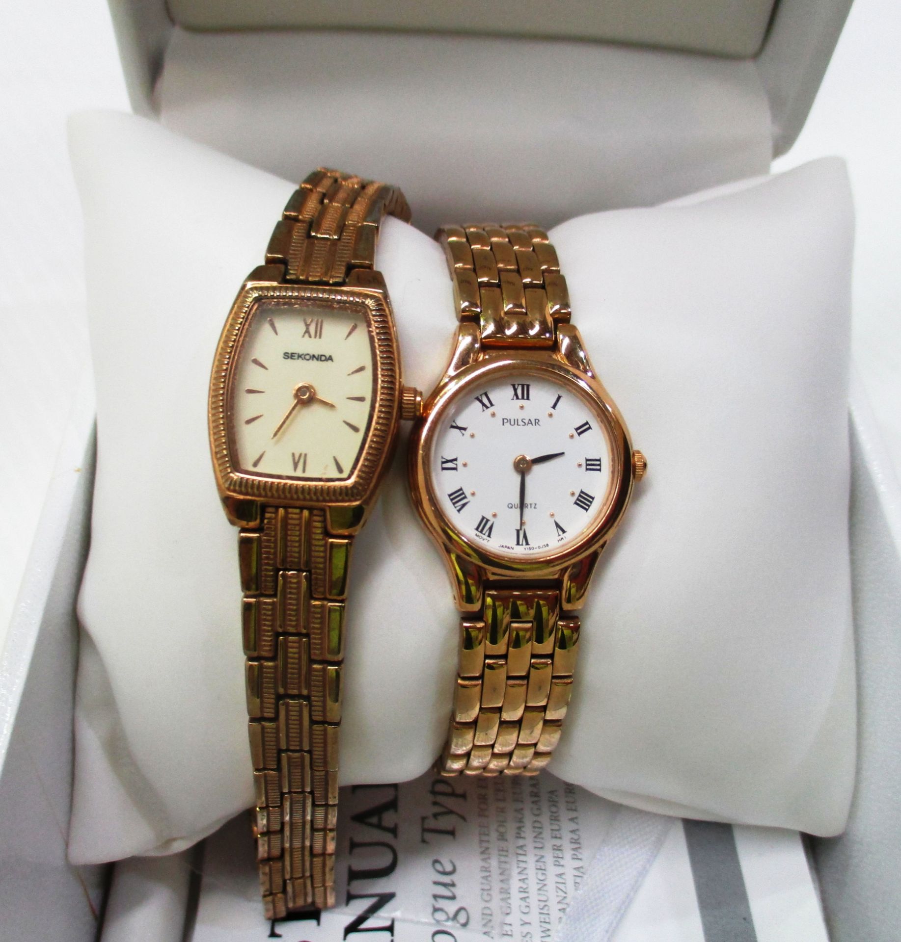 A ladies Sekonda wristwatch with gold coloured strap and a ladies Pulsar wristwatch (with original