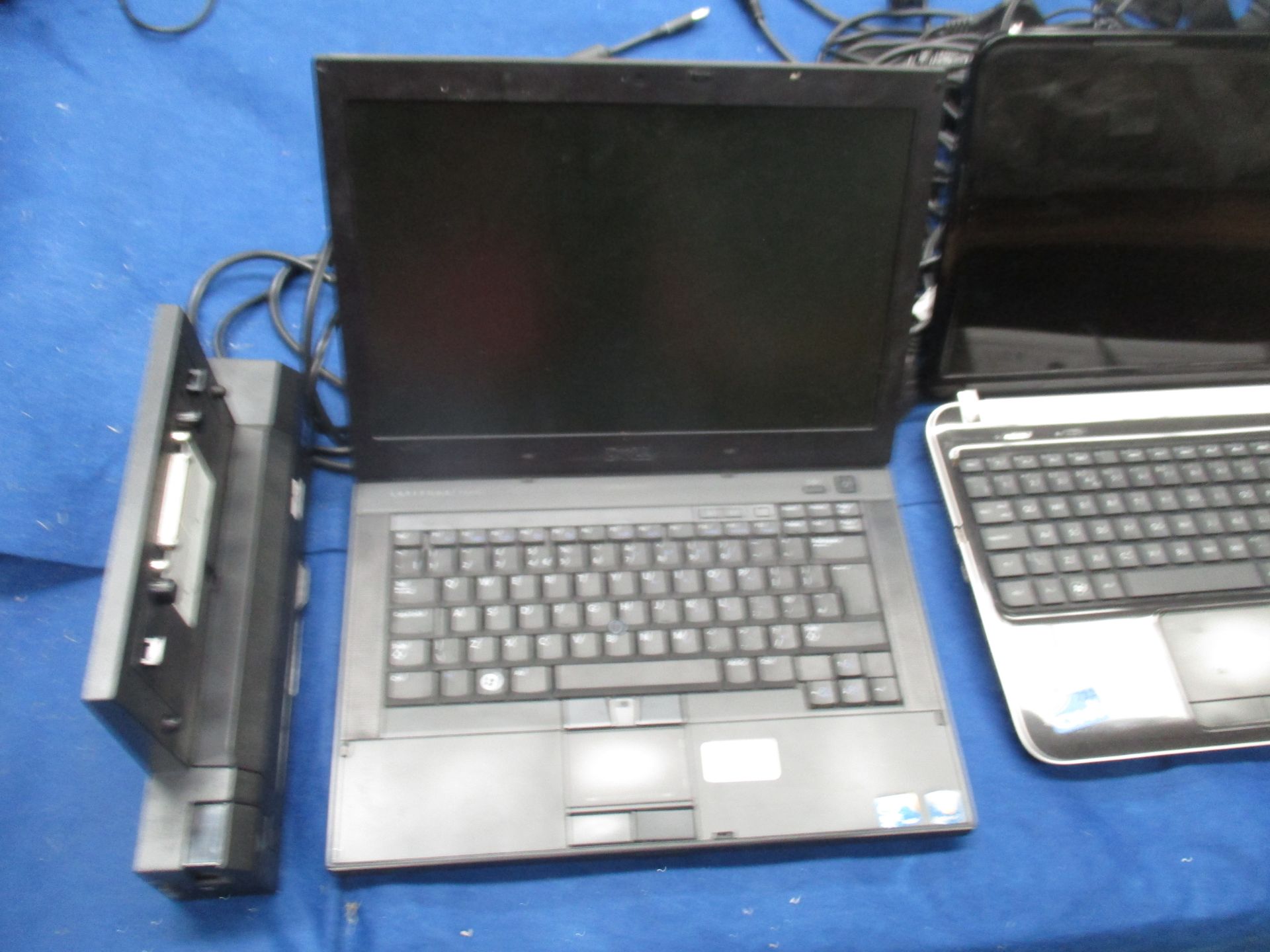 A Dell Latitude E6410 laptop computer with power lead,