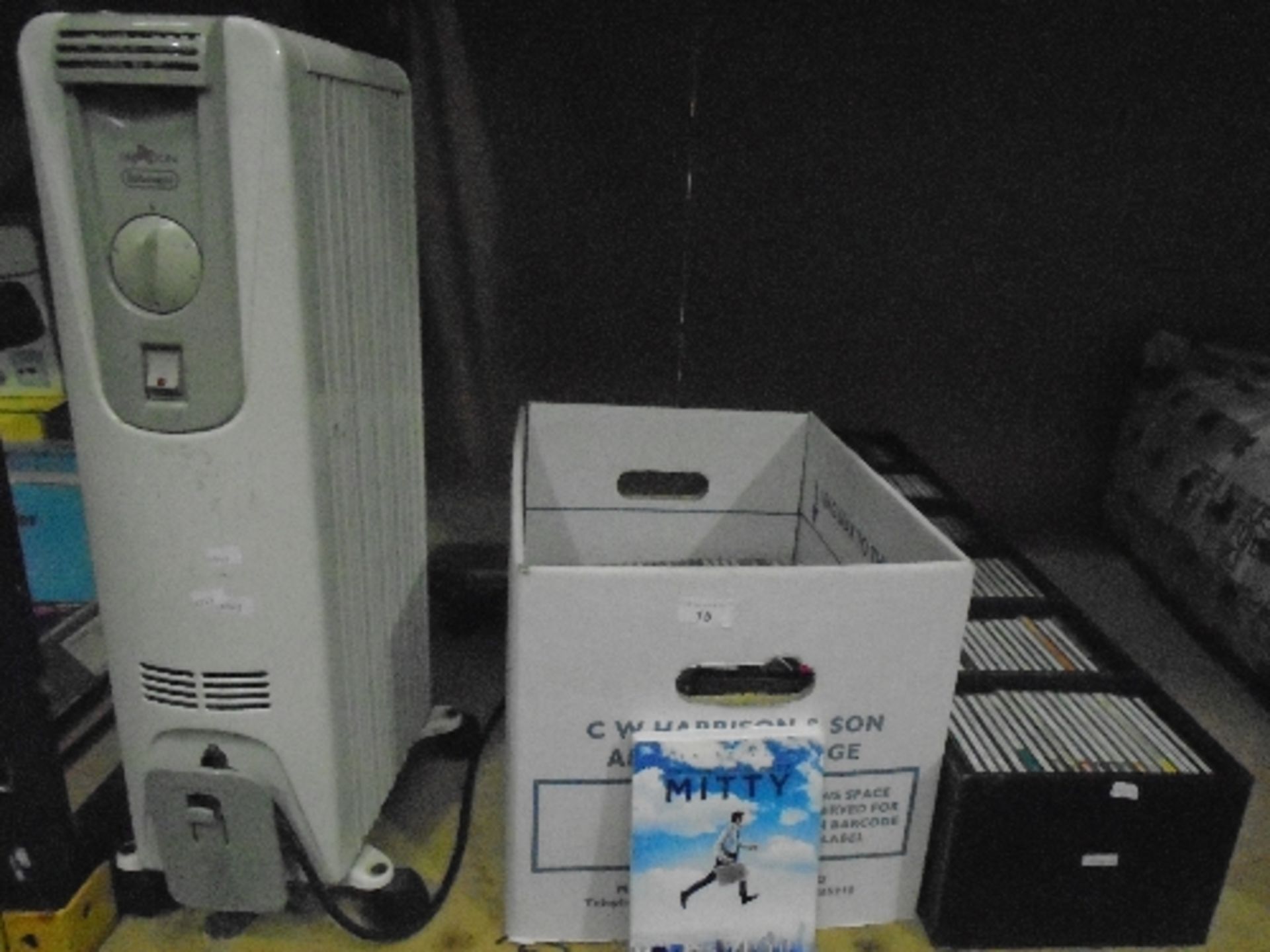 A Delonghi Dragon oil filled radiator - 240v and a quantity of assorted CDs and DVDs (mainly