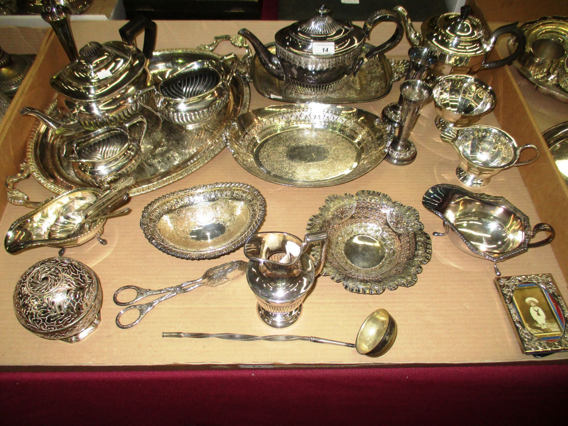 Quantity of plated wares including three piece tea service, a three piece ribbed tea service, trays,