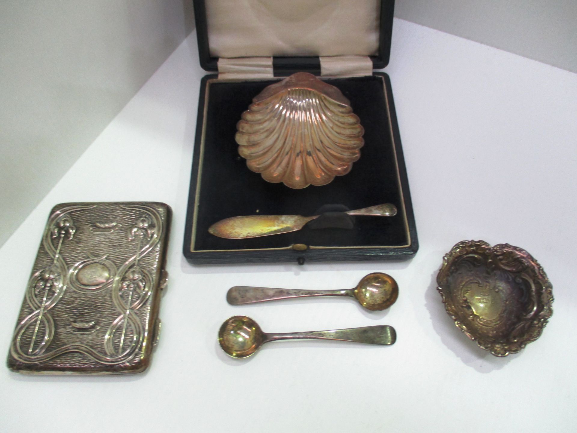 Silver comprising a shell shaped butter dish with knife,