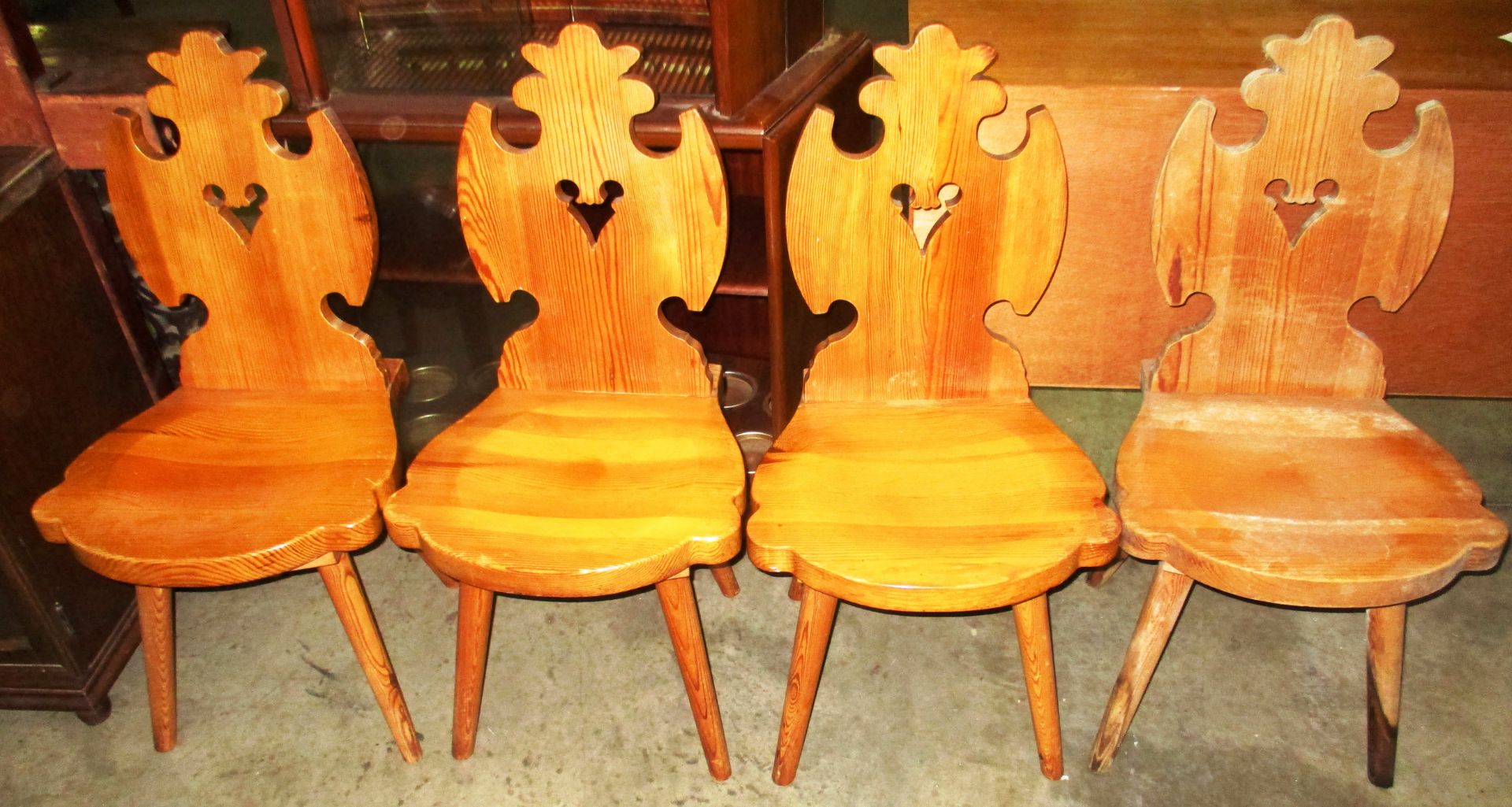 Four pine dining chairs