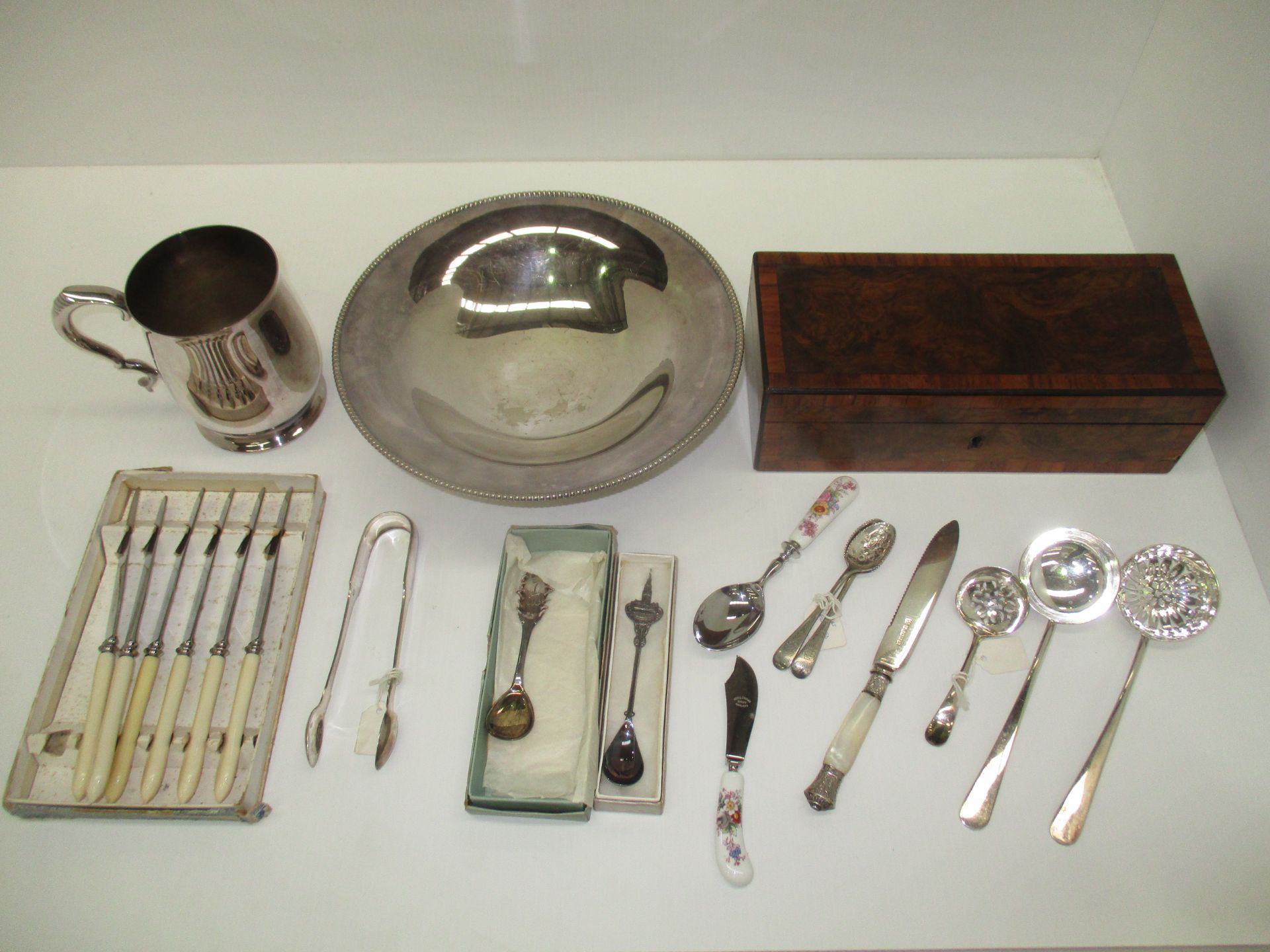 Quantity of plated wares - a beaded rim bowl on stand, tankard, sugar tongs, knives,