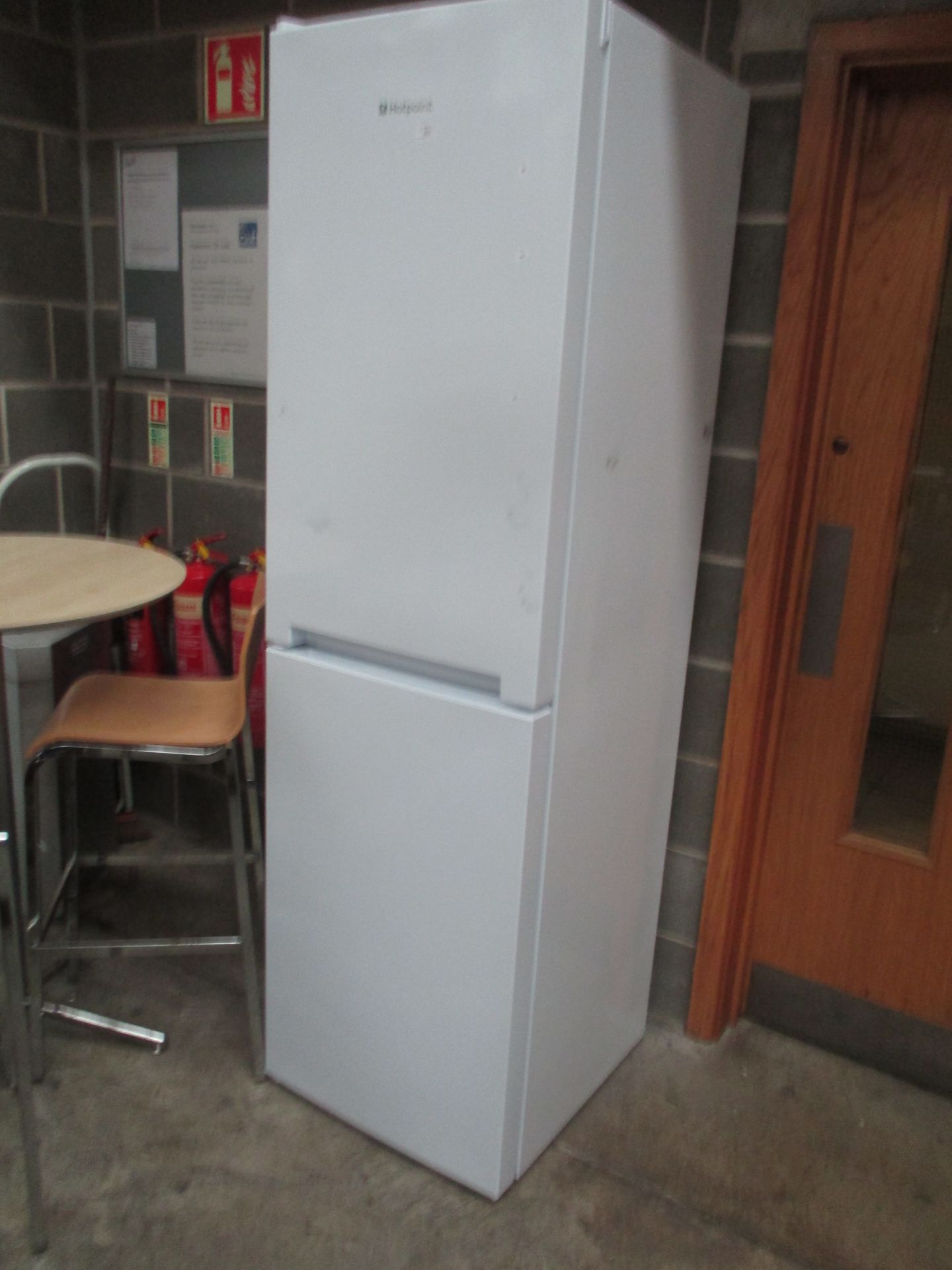 A HotPoint SMX95TU white upright fridge/freezer