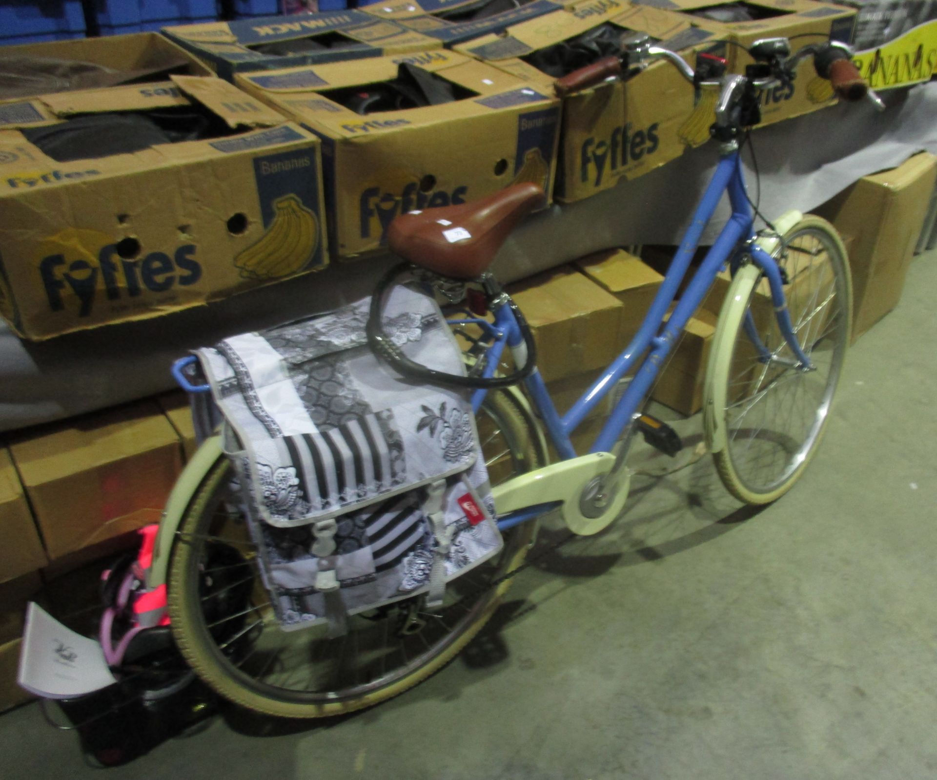 A Pendleton Somerby six speed ladies bicycle in baby blue complete with front basket, safety helmet,