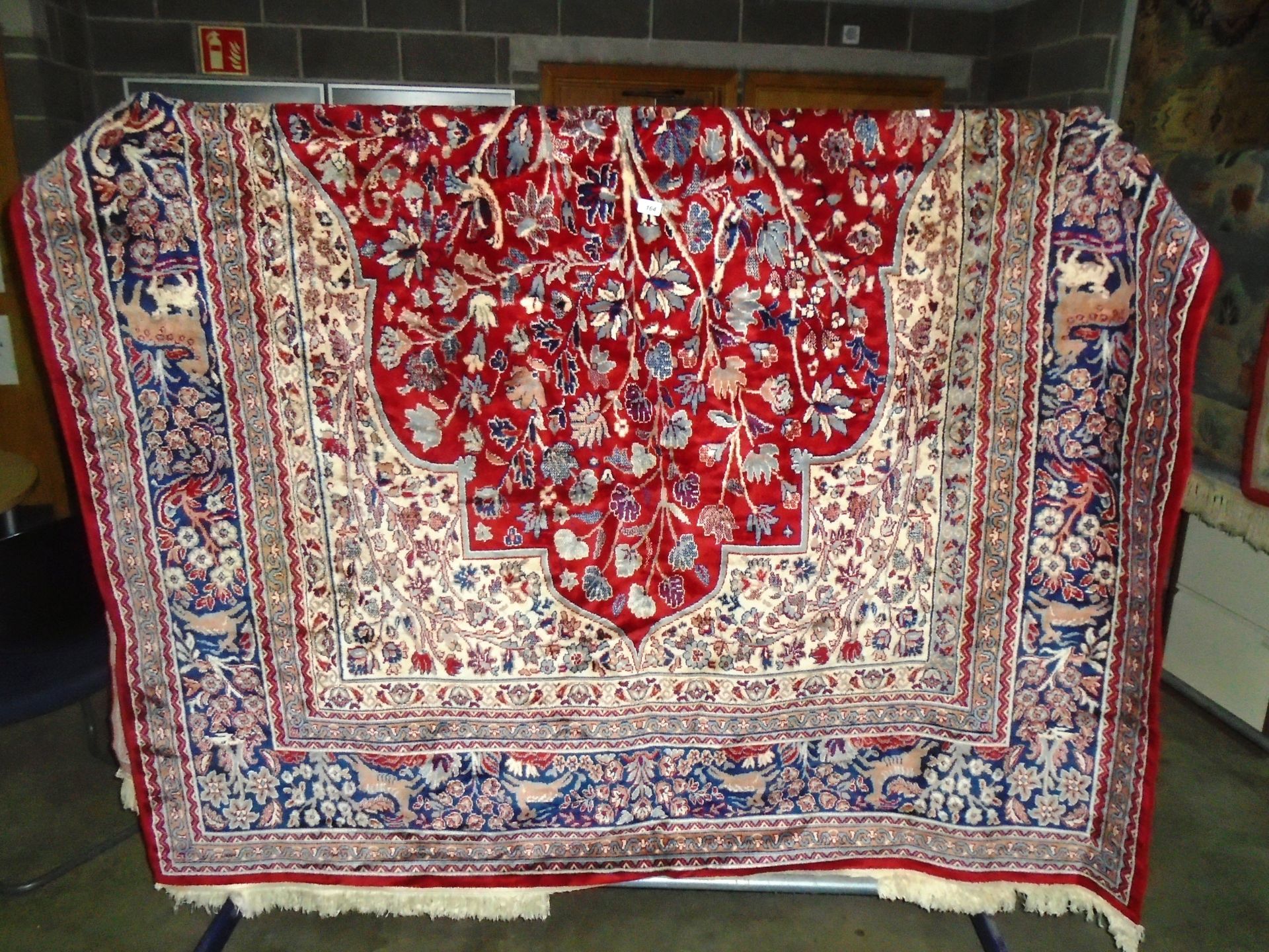 Large red/blue/light brown floral patterned rug 200 x 300cm