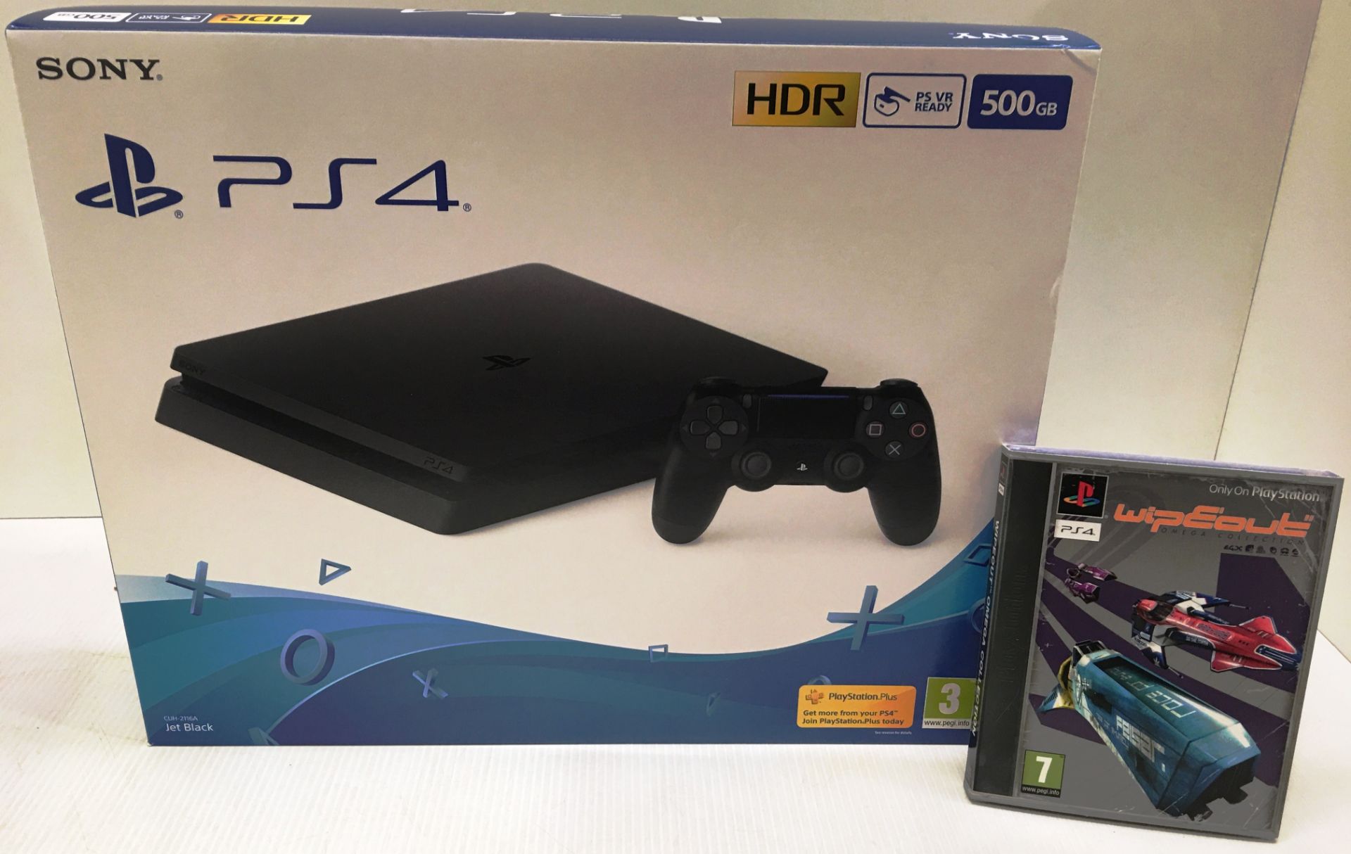 A Sony Playstation 4 500GB jet black gaming console (boxed) complete with Wipeout game and original