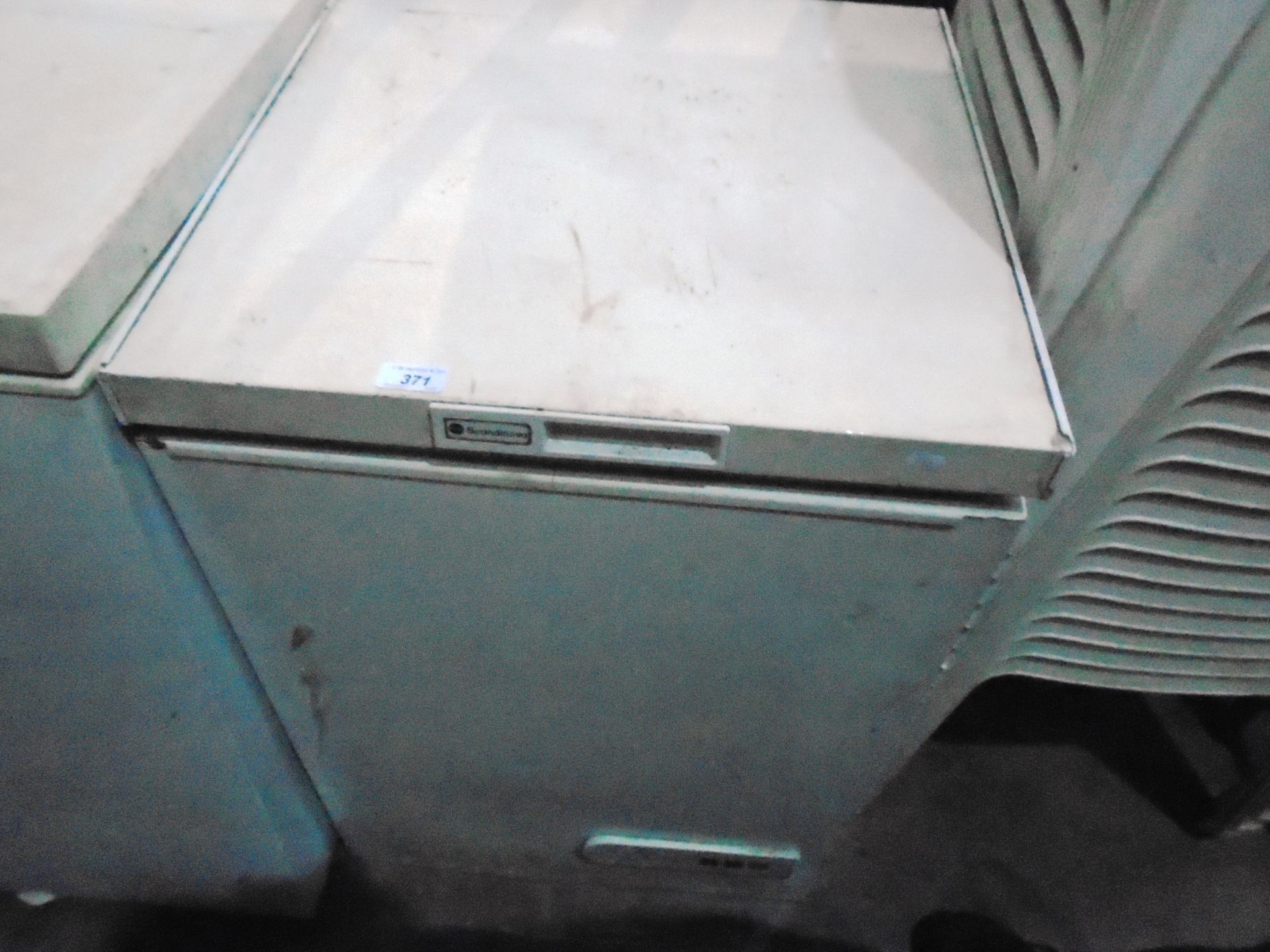 A Scandinova white chest freezer