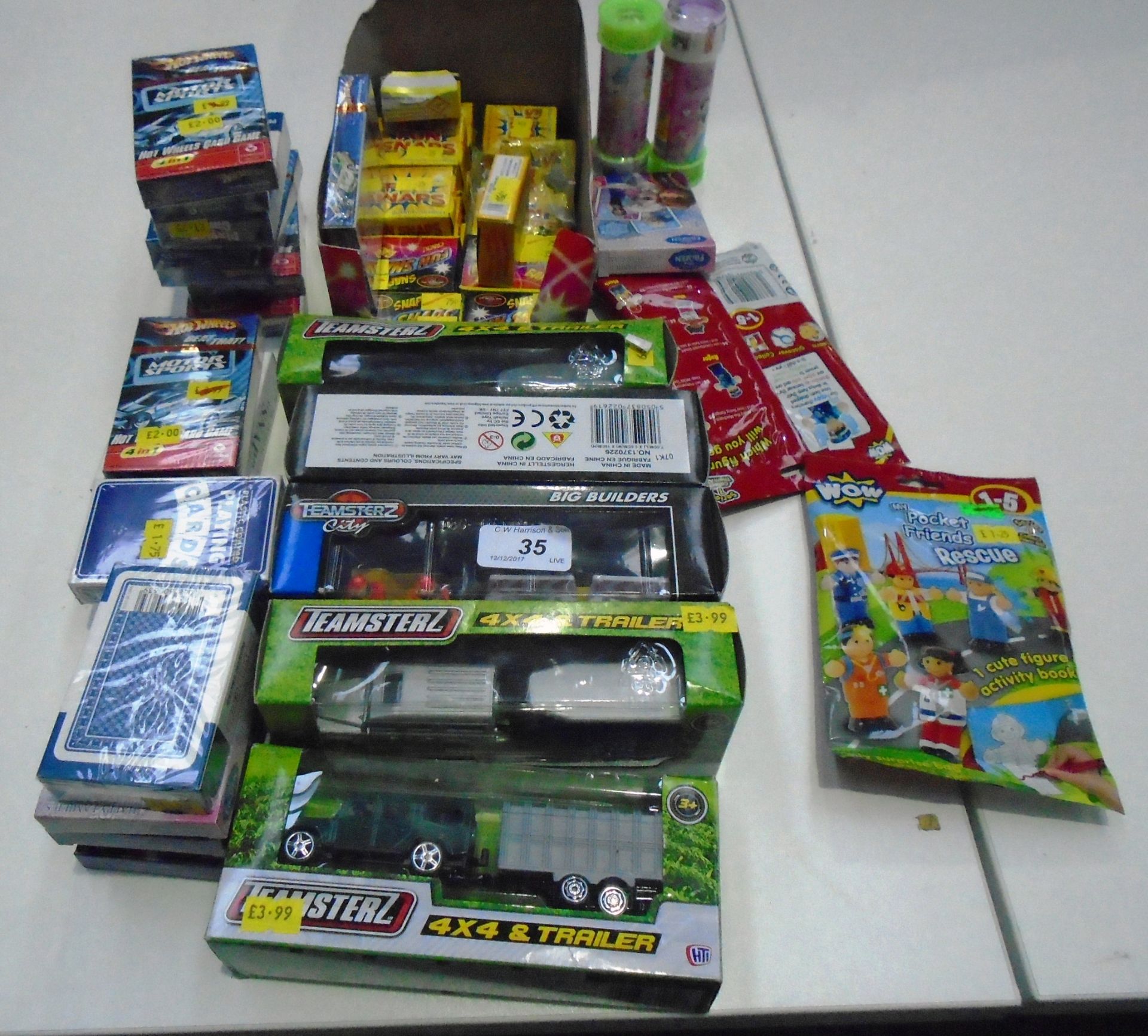 50 x assorted items - packs of Hot Wheels card games, Teamsterz 4 x 4 and trailer die cast vehicles,