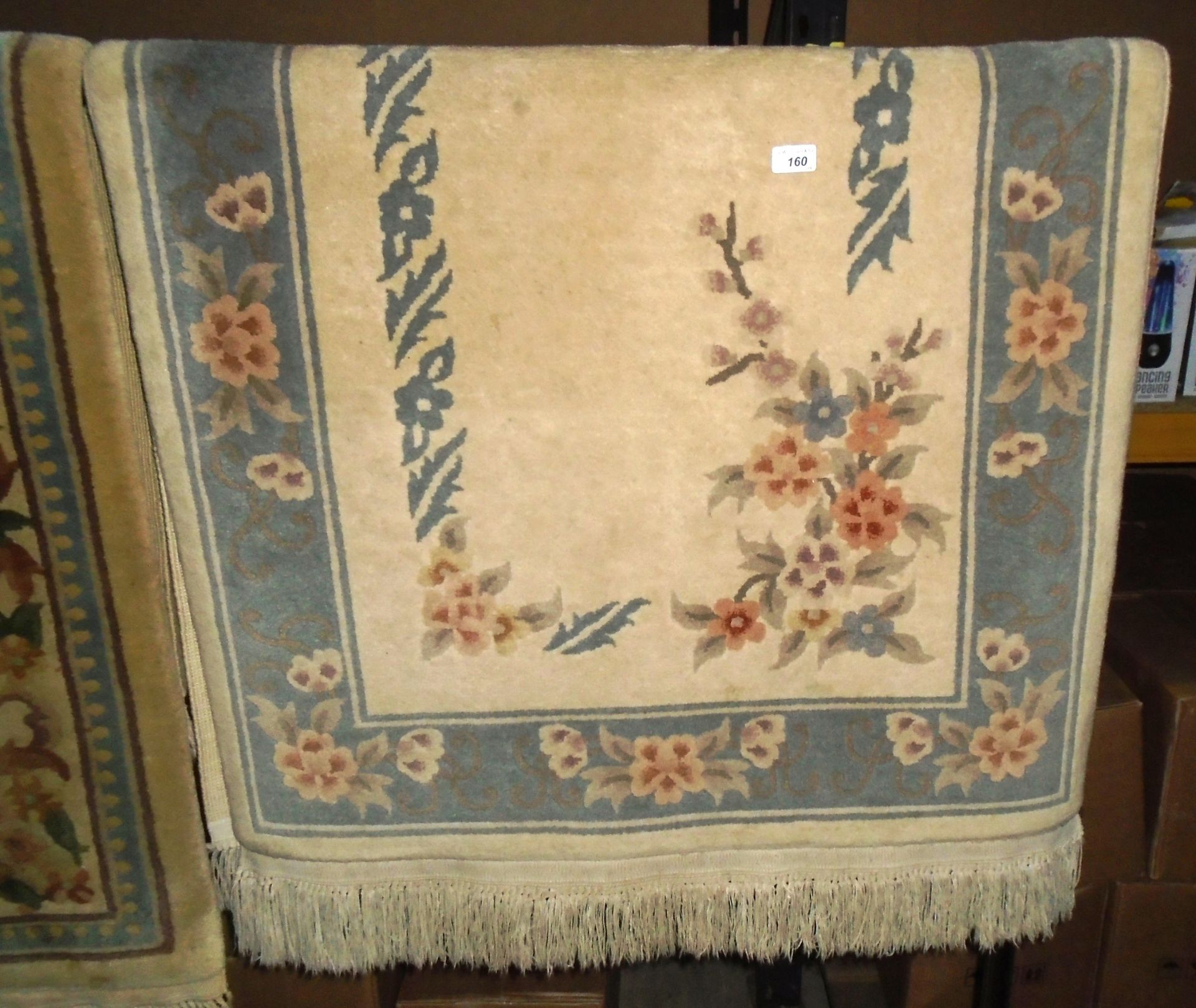 A beige and blue patterned Chinese rugs 160 x 90cm