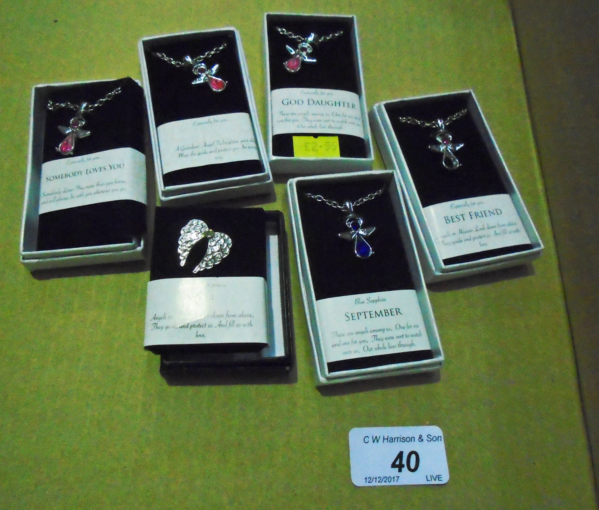 77 x assorted Protective Angels necklaces and brooches RRP £2.