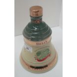 A 70cl Wade porcelain decanter containing Bell's Extra Special Old Scotch Whisky [aged 8 years] for