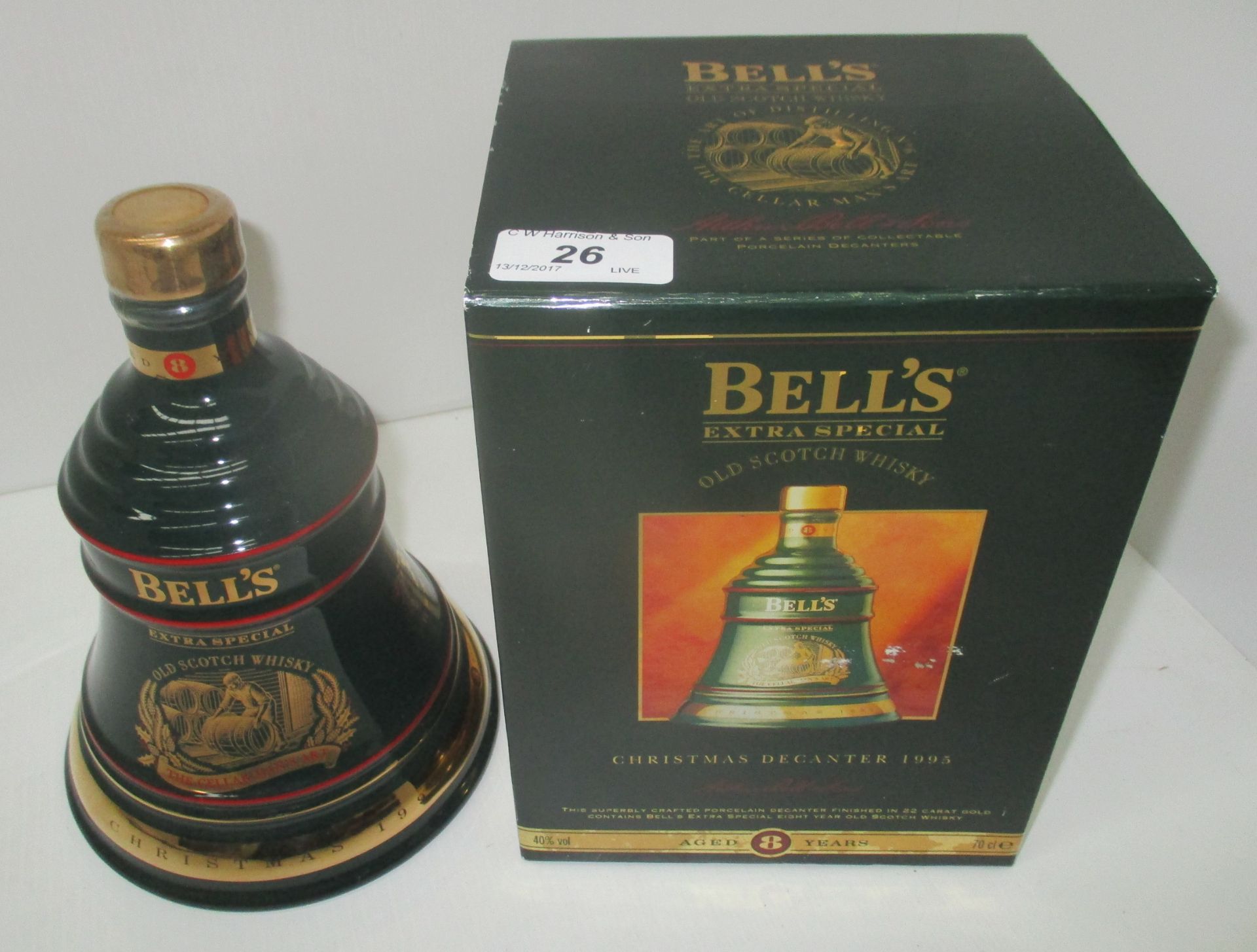 A 70cl Wade porcelain decanter containing Bell's Extra Special Old Scotch Whisky for Christmas 1995