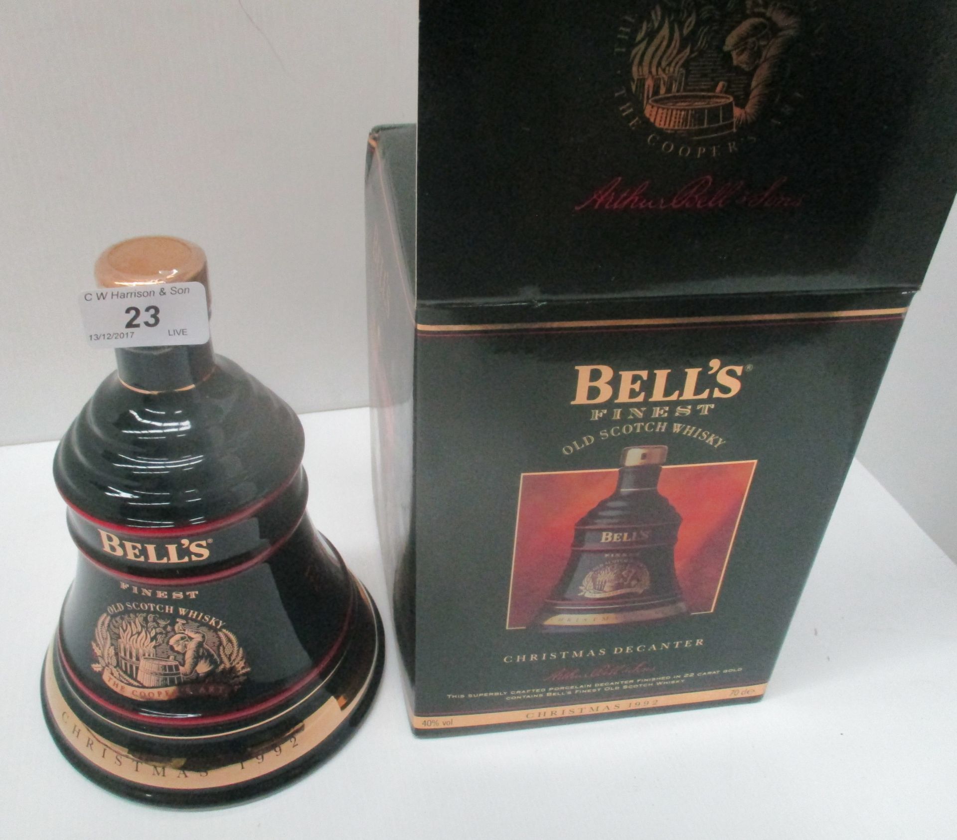 A 70cl Wade porcelain decanter containing Bell's Extra Special Old Scotch Whisky for Christmas 1992