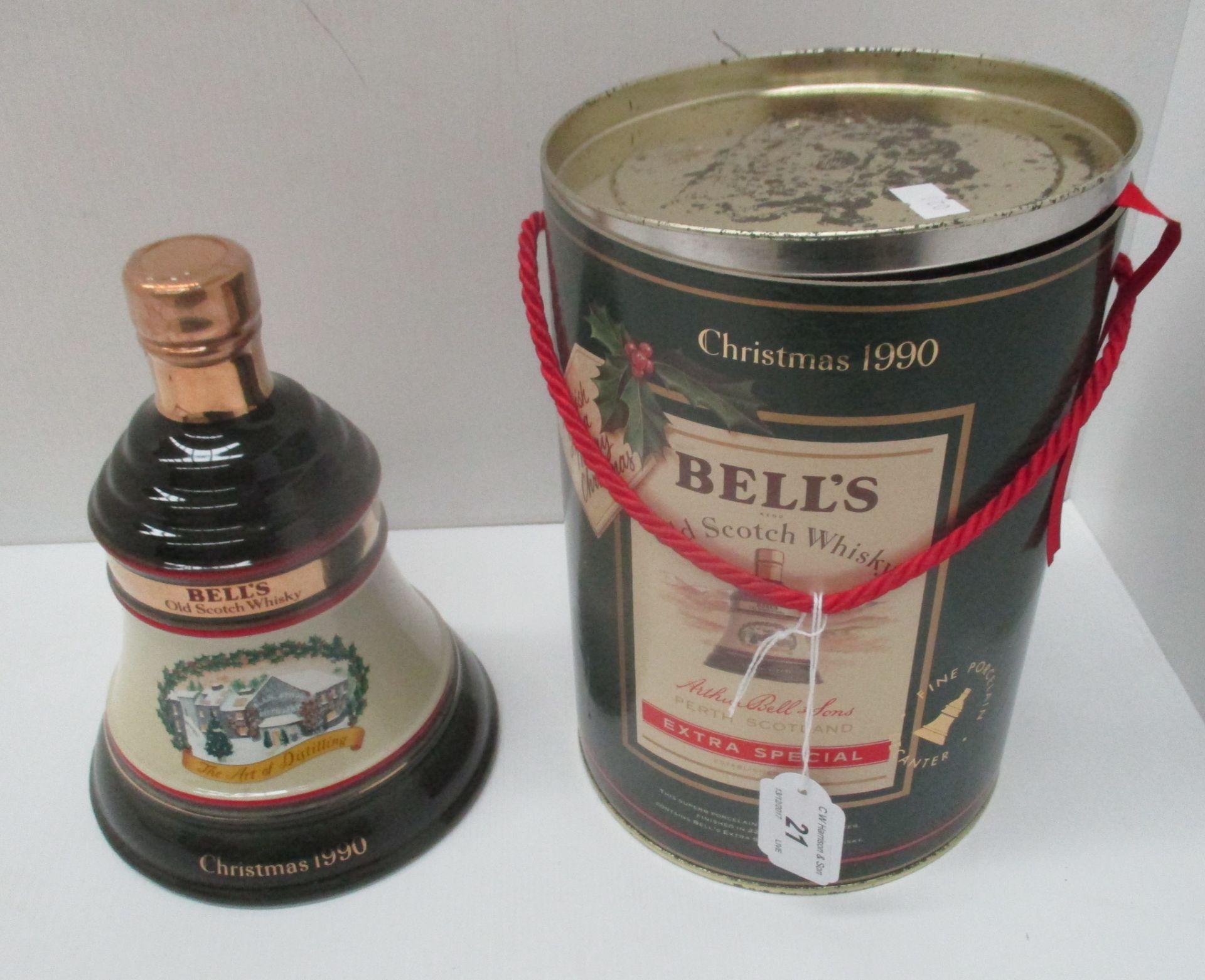 A 75cl Wade porcelain decanter containing Bell's Extra Special Old Scotch Whisky for Christmas 1990