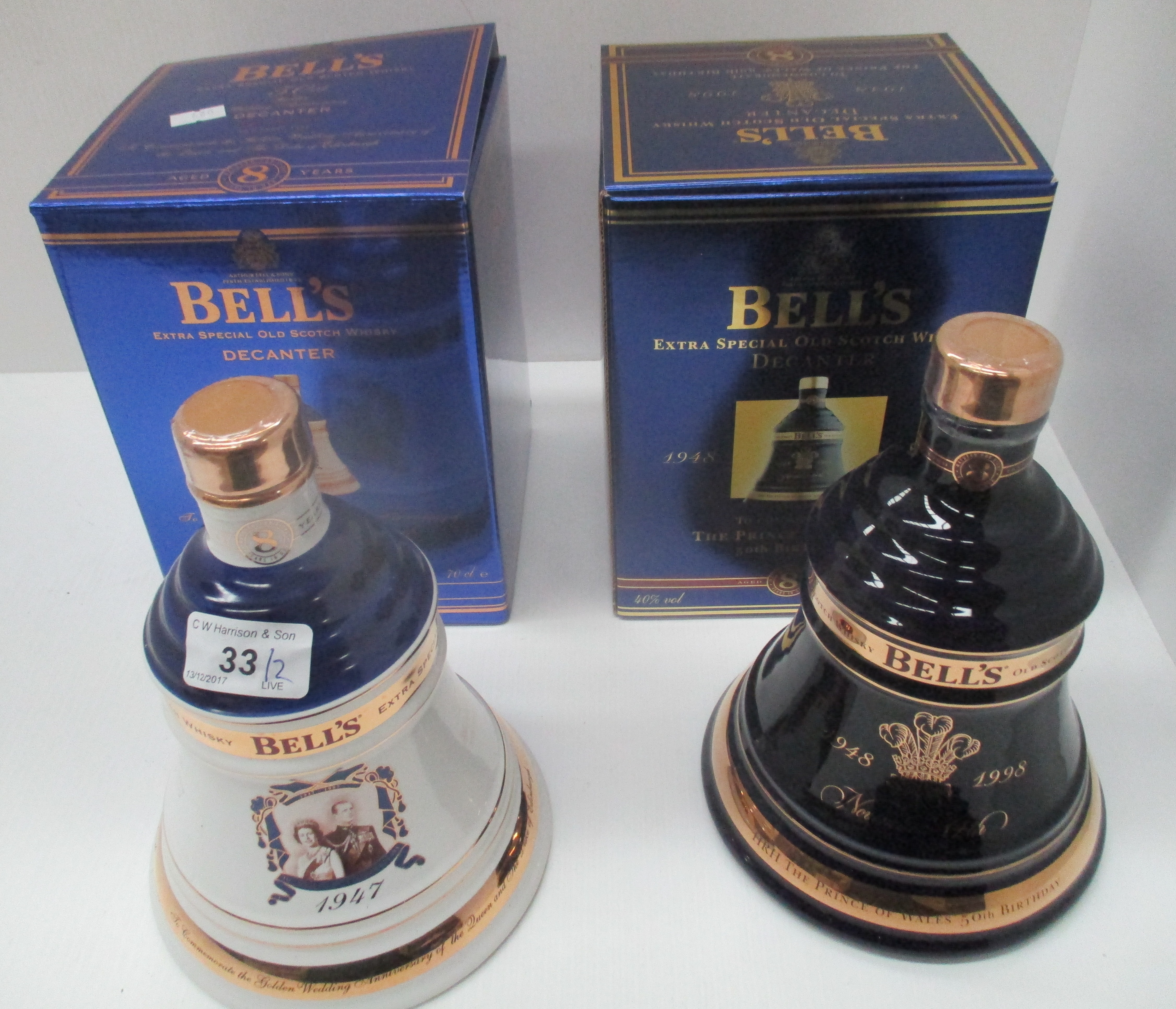 2 x 70cl Wade commemorative porcelain decanters for Bell's containing Bell's Old Scotch whisky