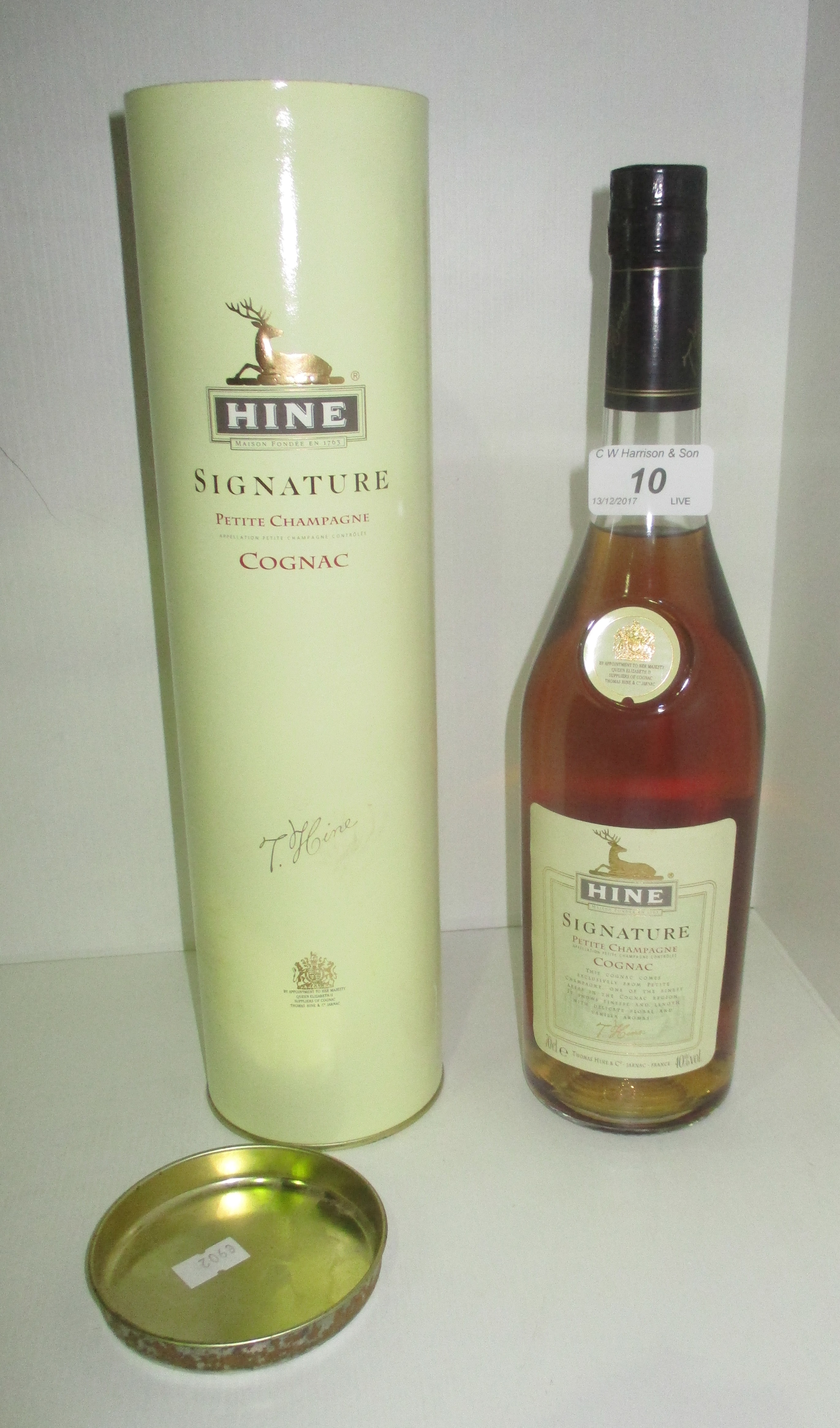 A 70cl bottle of Hine Signature Petite Champagne cognac in presentation box