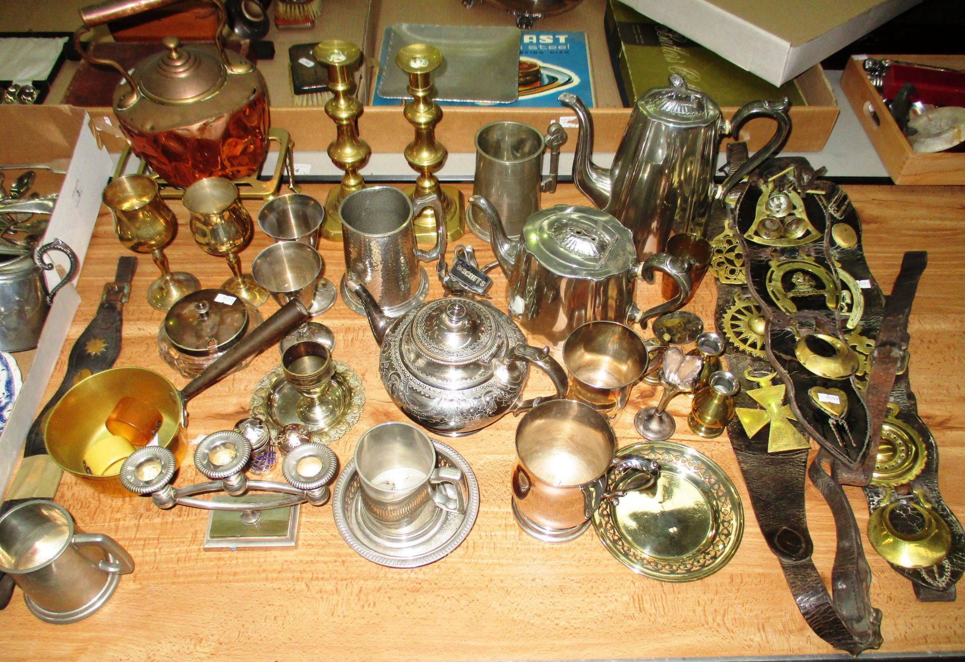 A quantity of assorted metal wares including a plated tea and coffee pot, assorted brassware,