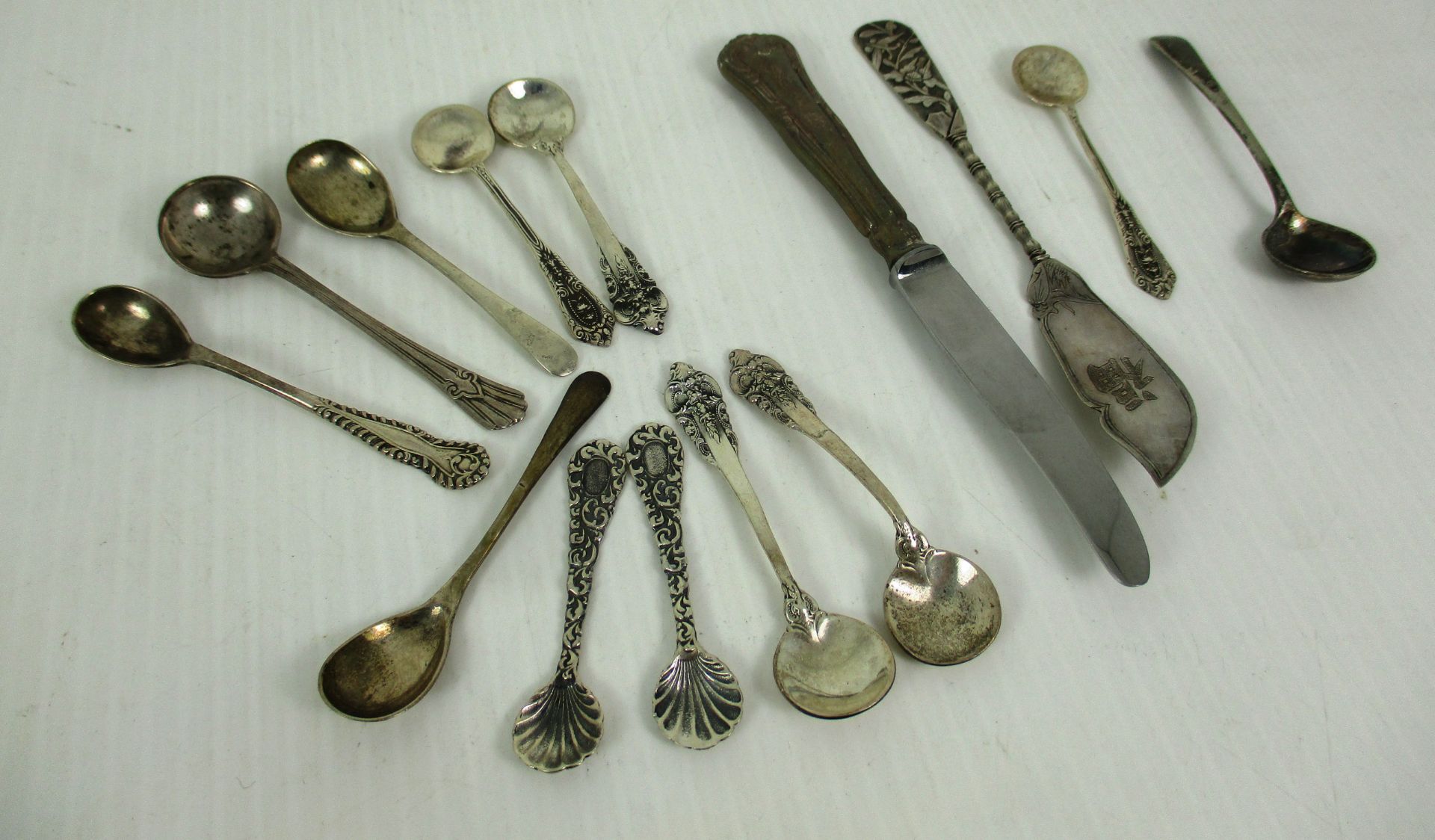 Ten silver mustard spoons (total approx weight 1.