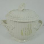 A Leeds pottery cream ware jar with lid, ribbed body with decorative handles,