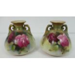 A pair of Royal Worcester baluster squat vase decorated with Hadley style roses (8.