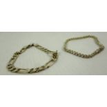 A silver flat link bracelet and another silver bracelet set with cubic Zirconia