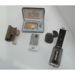 A Ronson lighter, a Buler gas lighter in box, a lighter in a bakelite case,