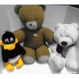 2 large soft toy teddy bears and a soft toy 'Daffie Duck'