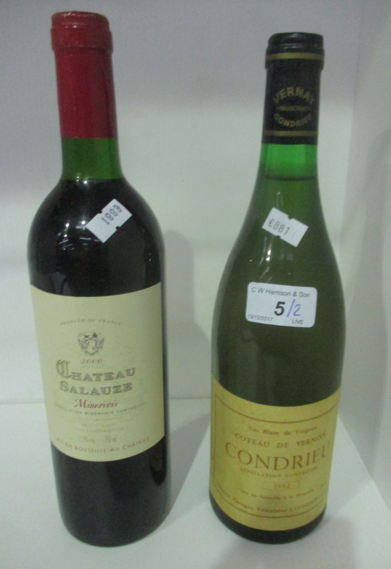 A 750ml bottle of Chateau Salauze Minervois 2000 red wine and a 75cl bottle of Coteau deVernon