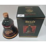 A 70cl Wade porcelain decanter containing Bell's Extra Special Old Scotch Whisky for Christmas 1993