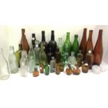 A collection of old glass bottles including Jones Bros, Auckland, The Maltine Manufacturing Co,