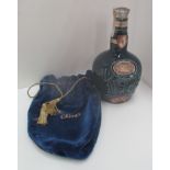 A 75cl Spode blue pottery liqueur bottle containing 26 2/3 fl.oz/75.