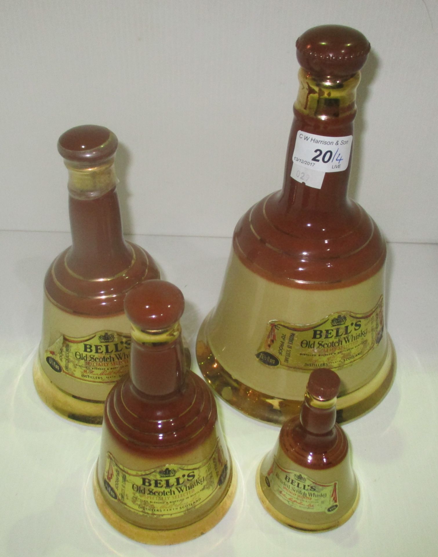 A graduated set of 4 Wade Bell's Old Scotch Whisky decanters - 75.cl, 37.8cl, 18.