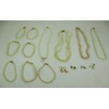 A quantity of assorted pearls - four pearl necklaces,