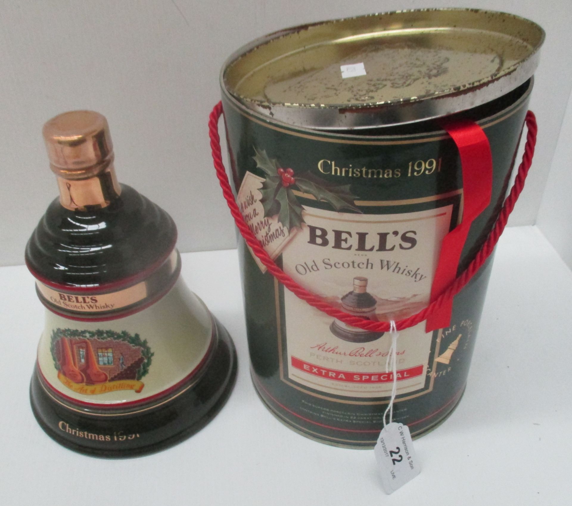 A 70cl Wade porcelain decanter containing Bell's Extra Special Old Scotch Whisky for Christmas 1991