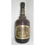 A one litre bottle of Bowmore Islay Single malt Whisky aged 12 years
